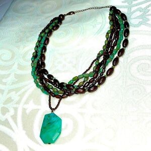 Multi-strand faux turquoise pendant adjustable necklace of browns and blue green